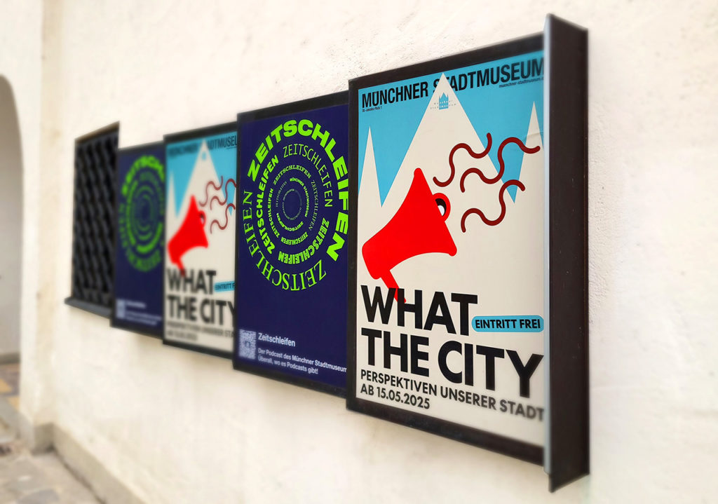 Plakate zur Ausstellung What the City - Perspektiven unserer Stadt im Münchner Stadtmuseum